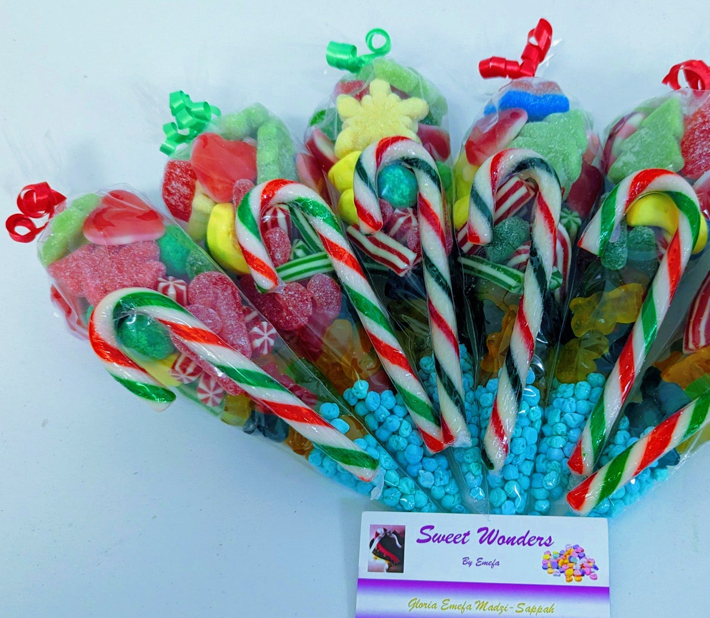Assorted festive colorful  sweets and candy cane. The perfect party bag fillers, Christmas sweet for kids and anyone young at heart.